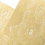 ヴィンテージゴールド（ゴールドの用紙）に活版印刷で白インキを使ったカード