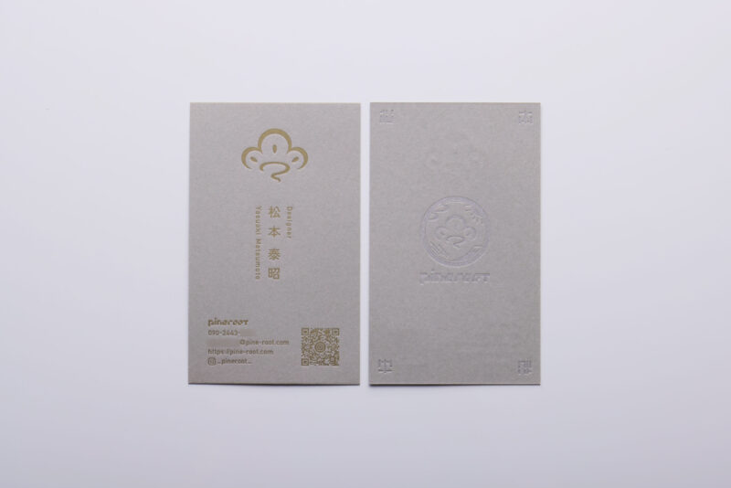 グレーに青口金と銀活版名刺